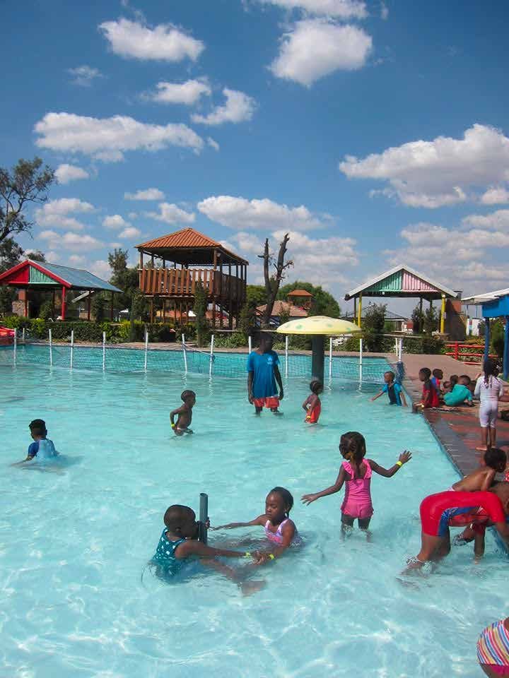 Children swimming on a youth outing